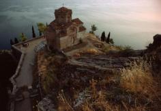 
                    
                        The small monastic church of St John at Kaneo sits perched atop a rocky precipice overlooking Lake Ohrid in Macedonia, Yugoslavia Photograph by James L. Stanfield
                    
                