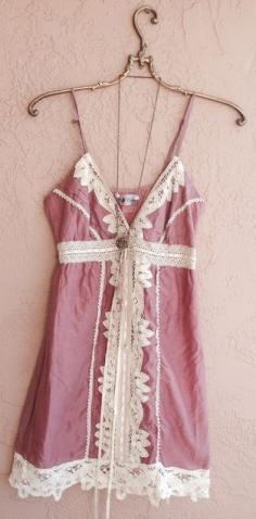 
                    
                        Romantic pink dress with battenberg lace details
                    
                