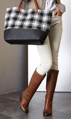 
                    
                        brown boots with black and white bag
                    
                