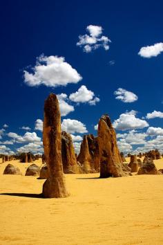 Pinnacles Desert in Nambung National Park, Western Australia. Located in two fire signs which explains the desert as a place of heat and of lack of water here: the male sign Aries the main indicator for phallic forms and towers with Sagittarius. Valid for field level 2 which describes  how the small desert is embedded in the region of Western Australia.