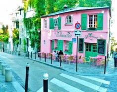 
                    
                        Pink cafe in Paris: It's on a quiet cobblestone street at the back of Montmartre...a perfect place for un cafe, a glass of rose, maybe some madeleines and lounging a la Parisien!
                    
                