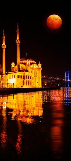 
                    
                        Scenic View of Ortakoy Mosque and Bosphorus Bridge with Lunar eclipse Istanbul, Turkey  |   Top 11 Reasons to Visit Istanbul
                    
                