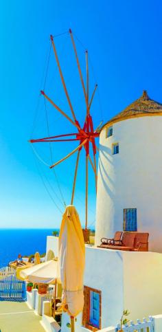 
                    
                        Amazing view to the Sea including a pictorial old traditional windmill in Oia the most beautiful village of Santorini island in Greece    |    10 Breathtaking Photos of World's Most Romantic Island
                    
                