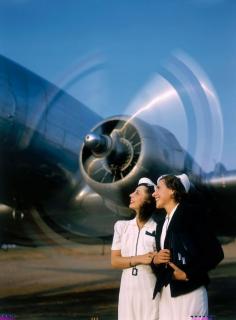 
                    
                        Two young women stand near a turning aircraft propeller, 1940.Photograph by Luis Marden
                    
                