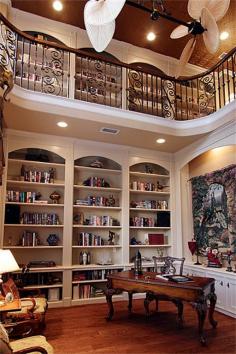
                    
                        Home library... This library for the current living room. Add a second story on the flat roof to finish the library and sitting area. preferably a round roof to add to the nautical feel of the home.
                    
                