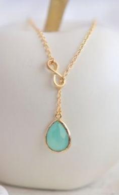 
                    
                        AquaTeadrop and Gold Infinity Lariat Necklace
                    
                