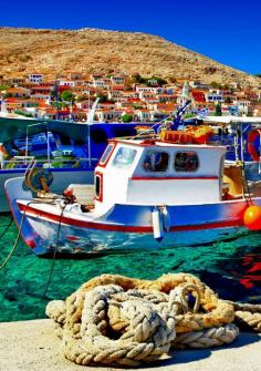 
                    
                        Colorful Halki island, Greece | 25 Gorgeous Pictures Of Greece That Will Take Your Breath Away
                    
                