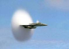 airplane breaking the sound barrier / perfect timing photo