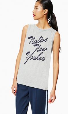 
                    
                        For your inner New Yorker: an easy grey muscle tank thatÃs ready to pair with anything.
                    
                