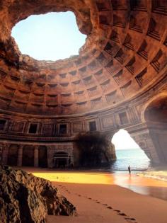 This fake "Forgotten Temple of Lysistrata, Greece“ is nothing more than an impressive sea cave near Benagil Beach, Algarve, in Portugal, overlaid with a dome image in Photoshop. See to original cave after the jump.