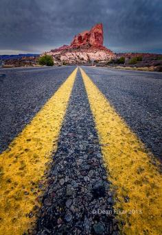 
                    
                        Road view towards a large monolith in Arches National Park, Utah
                    
                