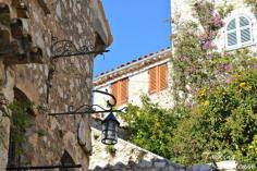 
                    
                        Eze France Travel Ideas - Even in winter there are flowers growing on the walls and orange trees full of fruit.
                    
                