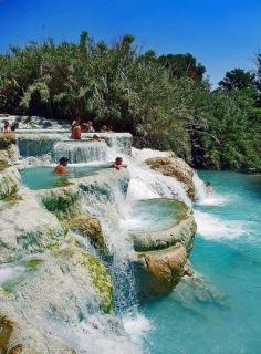 
                    
                        Mineral Baths, Saturnia, Tuscany, Italy. Terme di Saturnia are a group of lush geothermal springs located in the municipality of Manciano, just a few kilometres from the village of Saturnia, Italy. The thermal waters of Saturnia have a series of cascades at 37°, where nature forms dozens of beautiful pools at different levels.
                    
                