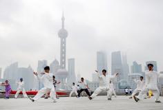 
                    
                        A morning walk along the Bund in Shanghai offered glimpses of tai chi practitioners  and a beautiful view of Pudong from across the Huangpu River.
                    
                