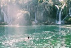 
                    
                        Kravice Waterfalls, Mostar, Bosnia and Herzegovina - Swimming in...
                    
                