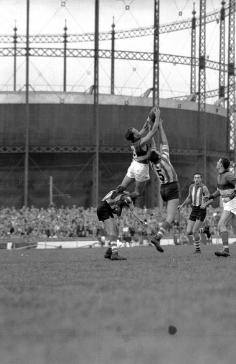 Victoria, Australia 1960s: April 1960: Footscray footballer Ted Whitten taking a mark against North Melbourne at the ...