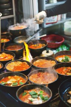 
                    
                        bubbling stone pots of fiery jjigae (stew), Namdaemun Market, Seoul, Korea
                    
                