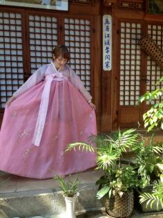 
                    
                        Trying on a Hanbok in Bukchon Hanbok Village, Seoul, South Korea
                    
                
