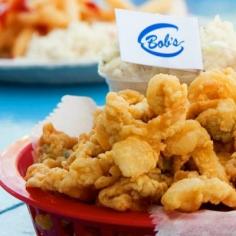 
                    
                        America's Best Seafood Dives: Bob's Clam Hut, Kittery, Maine. You have to love a clam spot where two versions of the lightest fried clams on the Eastern Seaboard compete for customers' attention: the traditional house recipe and Lillian's, named for the cashier who challenged the restaurant's kitchen with her own recipe, which she was sure was better. You can order either, and it will arrive at your table with a bright little flag marking it as Bob's or Lillian's. Coastalliving.com
                    
                