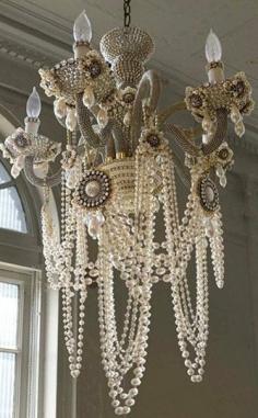pearl chandelier... Uhm, ok. I really need this. I'm sure it will fit in SOMEWHERE in my house!!