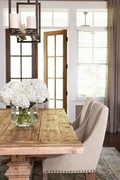 This is my dream dining room table! Natural farm table and upholstered chairs.