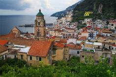 
                    
                        Amalfi, Amalfi, Italy - The Piazza Del Doumo towers above rooftops...
                    
                