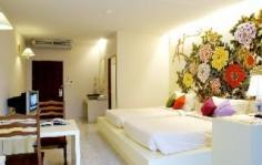 The hotel is located in the heart of Phuket old town, providing an easy access to the main road. It is a stylish apartment hotel, designed in Sino-Portuguese influences, accentuated with antiques adorning the hotel reception foyer. It features 57 rooms, that are exquisitely designed and replete with vital amenities. The property compromises of 18 Deluxe Beijing, 27 Deluxe Shanghai and 12 Sino Suites. Rooms are equipped with free minibars, free local calls and free Internet access. The hotel provides 50% discount at The Raintree Spa programs. Continental buffet breakfast is served at the hotel. The hotel is reachable within a 30 minutes drive from Phuket International Airport, 15 minutes from Rassada Pier and 10 minutes from Phuket city center.