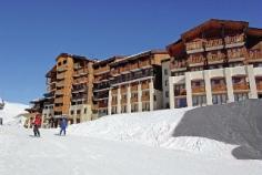 This ski hotel enjoys a quiet setting, despite being situated in the heart of the Belle Plagne resort. Guests will find a number of bars, pubs and shops in the immediate vicinity, whilst nightlife spots can be found 2km away. The ski slopes are a mere 150 m from the accommodation, and a natural skating rink and an outdoor heated swimming pool can be found 2km away. This residence is made up of 5 large chalets with slate roofs and wooden façades. The chalets comprise a total of 252 apartments. Facilities available at this establishment include a lobby, a bar, a restaurant and car parking. For an additional fee guests can enjoy room and laundry services, and younger guests can make new friends in the kids' club. All of the apartments include a fully equipped kitchen area with a fridge, oven, microwave, dishwasher, coffee maker and kettle. The bathroom comes with a toilet, bathtub and hairdryer. Other facilities include a direct dial telephone (fees apply), a TV set and a vacuum cleaner. Balconies/terraces are available, and guests can choose from the following types of accommodation: 1-bedroom apartments for 4-5 persons, 1- to 2-bedroom apartments for 6-7 persons and studios for 4 persons. The kids' club welcomes children from 18 months to 3 years of age. Indoor activities, such as games, drawing, singing and videos, as well as outdoor activities (snowmen, tobogganing), are played throughout the day under the supervision of qualified activity leaders (fees apply). Guests looking to work out can head to the nearby gym, just 300 m from the hotel, whilst those after a little more relaxation can head to the steam room or enjoy a massage or spa treatment. Three different meal options are available: the Liberty Card covers 3 meals over the duration of the stay, the Meal Card covers evening meals and the Half Board Card is for the breakfast buffet and dinner.