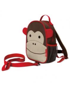 Disguised as a cute mini backpack, the Skip Hop Zoo Safety Harness keeps your little one close and safe anywhere you go. The detachable rein of this kid's safety harness hooks onto the bottom of the pack for better control and stability while the top handle is great for quick grabs. When your child is ready, remove the rein and use it as a kid's backpack. Featuring one spacious main compartment, a mesh storage pocket and padded shoulder straps, this kid and toddler harness also includes a write-on name tag inside the backpack in case it gets left behind on the playground. The Skip Hop Zoo Safety Harness is for ages 12 months and up to 4 years old. Features & Benefits: Adorable Skip Hop Zoo Safety Harness Keeps your little one close and safe Durable and functional for lots of use Use every day, when on the go, during trips and more Detachable rein hooks onto bottom of backpack for better control and stability Top handle for quick grabs Use as a small, stand-alone backpack Spacious main compartment Mesh storage pocket for a bottle or juice box Comfortable and adjustable padded shoulder straps Write-on name tag inside Sturdy metal hardware BPA, phthalate- and PVC-free Dimensions: 9" W x 7.5"H x 3.25"L For ages: 12 months to 4 years old