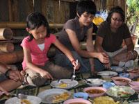Michelle Chen and kids enjoying farm cooking at Tigerland Rice Farm