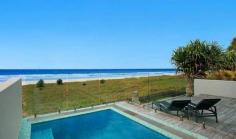 4 Bedroom Family Beachfront Home in Mermaid Beach, Gold Coast, modern family accommodation for an unforgettable holiday, with with pool, private ensuite and stunning beach views.