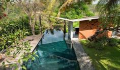 3 bedrooms Private Luxury Villa in Ubud, Bali designed by world renowned architect, offers the ultimate tropical living experience with epic views of Ayung river, infinity pool, personal chef, maid service, garden, kitchen, spa services & more. Don't wait, book now with Villa Getaways!