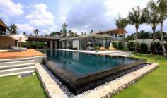 6-bedrooms Beachfront Phuket Villa offers tropical living, 25m infinity lap pool, maid service, personal chef, kitchen & modern amenities. Contact Villa Getaways
