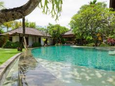 Designed as a holiday home for the owners themselves, this 4-bedroom villa has an wonderfully central location in Seminyak. Book with Villa Getaways.